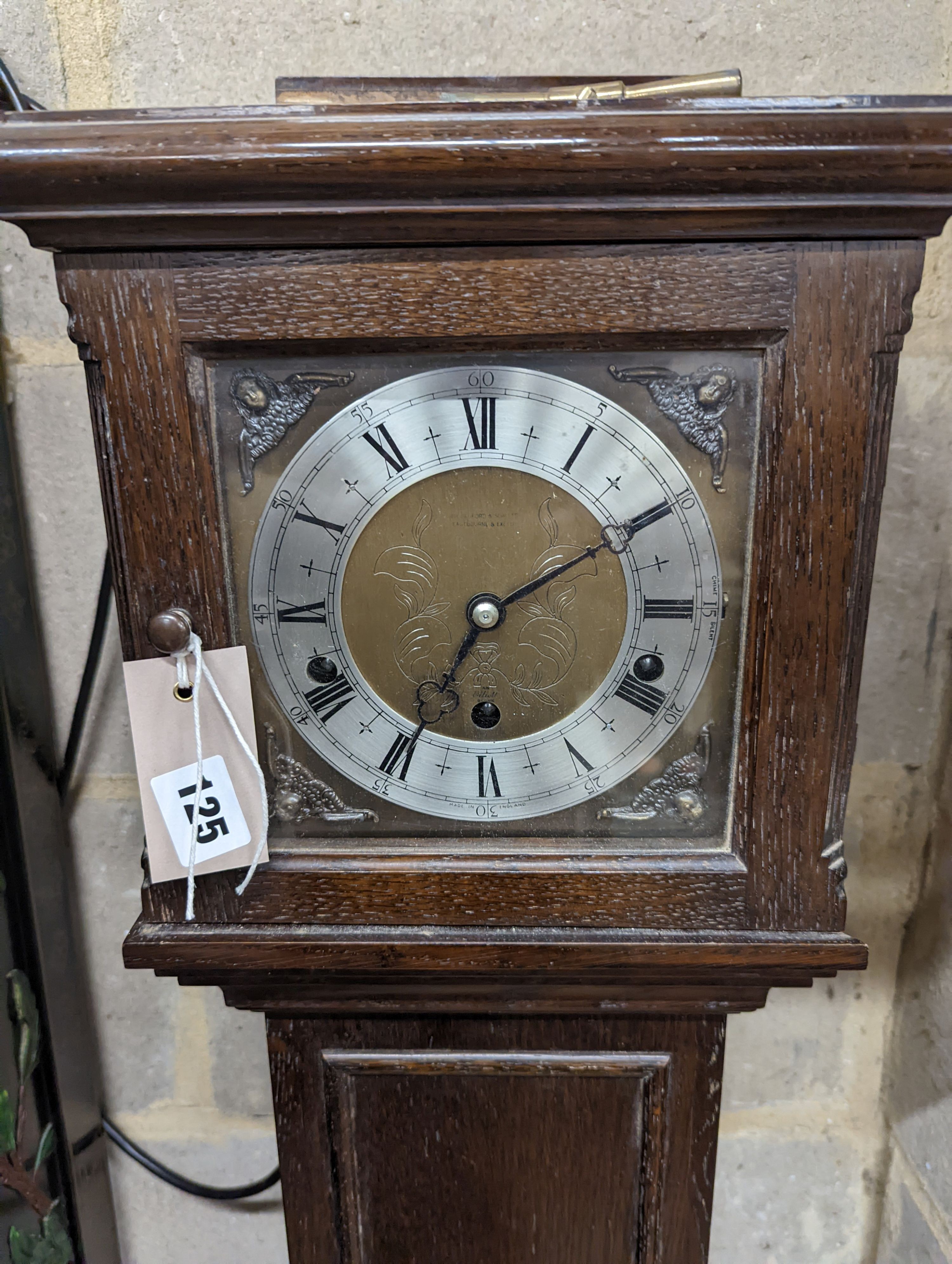 A 1920's oak cased grandmother clock, height 143cm